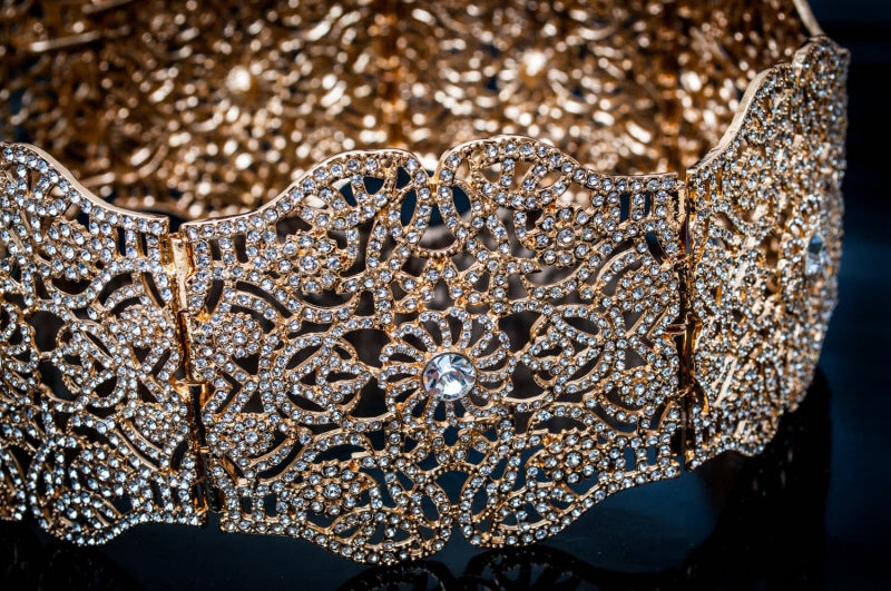 Gold oval belt with stones