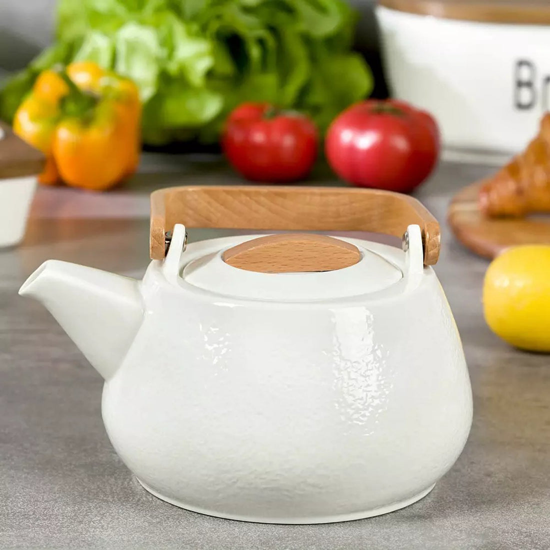 Porcelain Teapot - 1.2 Liters, Elegant Design with Beechwood Handle - Perfect for Tea Lovers